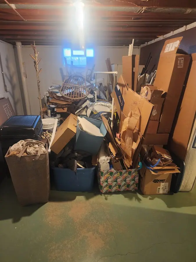 Roll-off dumpster container at job site for 4 Yard Dumpster Rental in Brevard